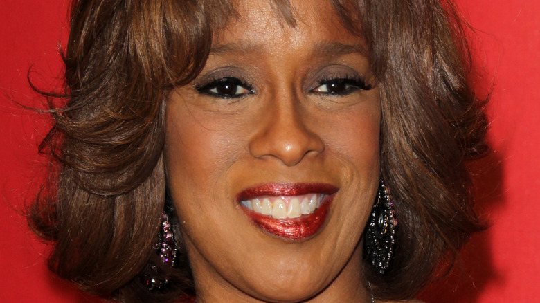 Gayle King smiles at an event