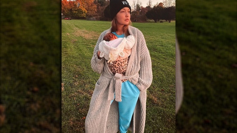 Gigi Hadid posing with baby Khai