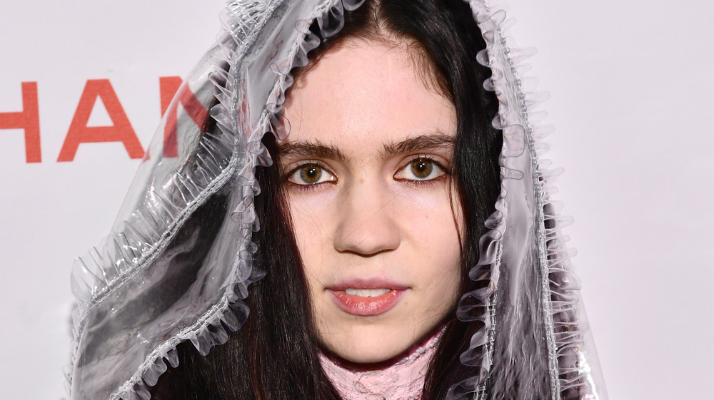 Grimes posing at a red carpet event