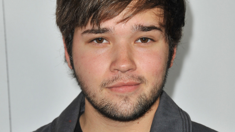 Nathan Kress smirking 