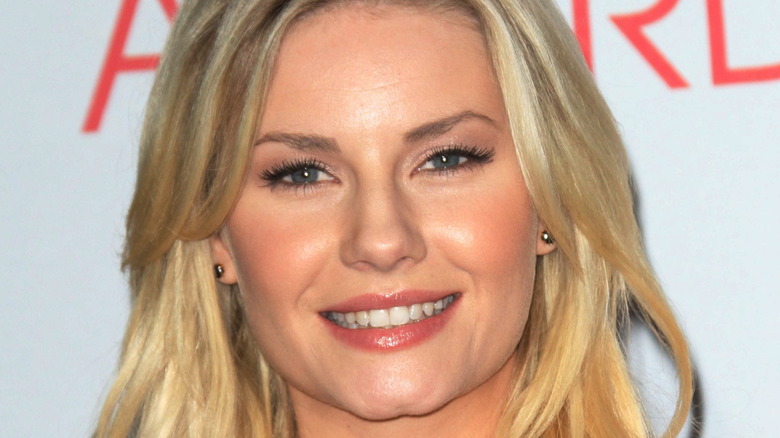 Elisha Cuthbert smiling broadly