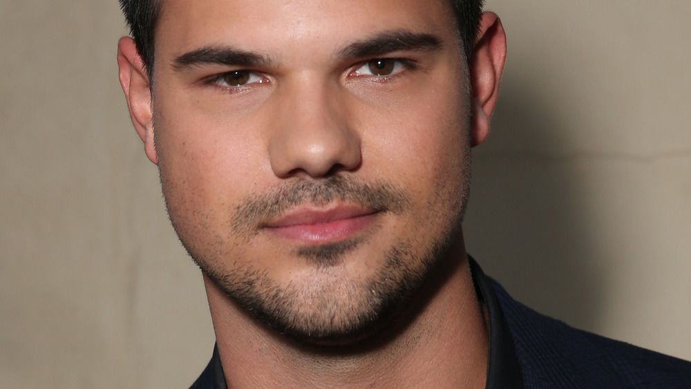 Taylor Lautner posing