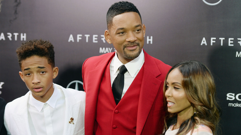 Jaden Smith with parents Will Smith and Jada Pinkett Smith at event