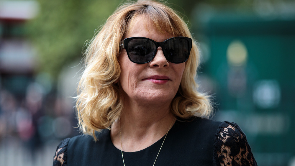 Kim Cattrall wearing sunglasses
