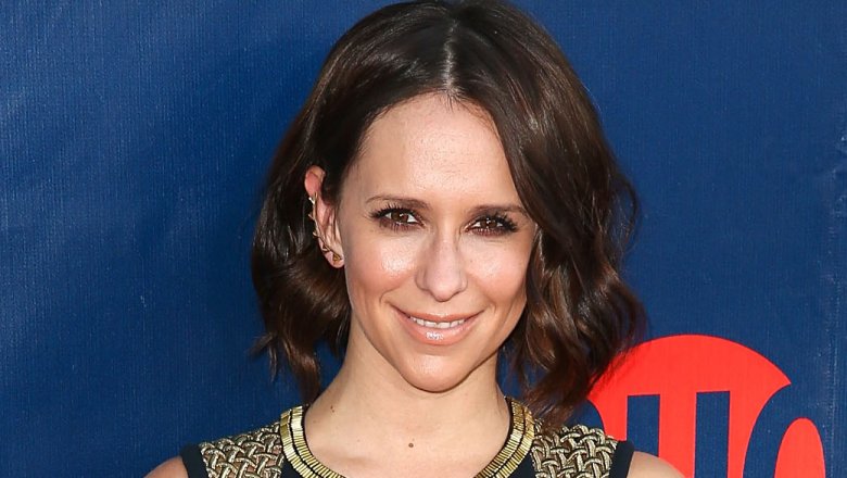 Jennifer Love Hewitt in black and gold top