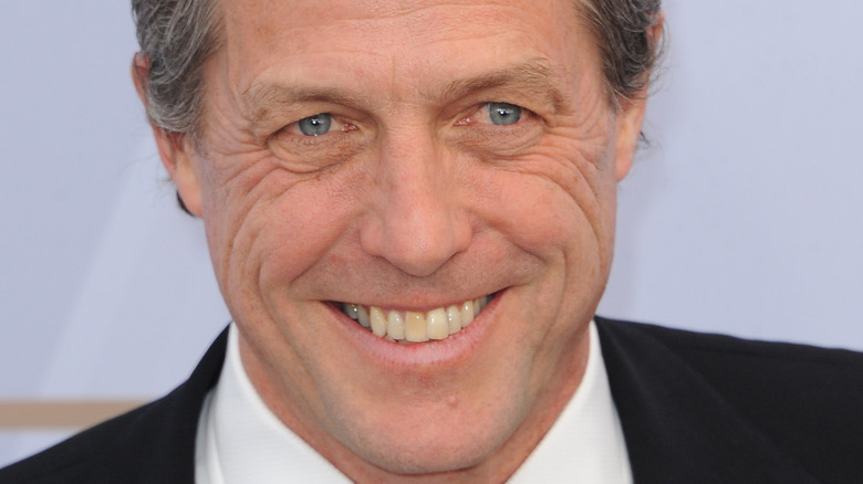 Hugh Grant smiling