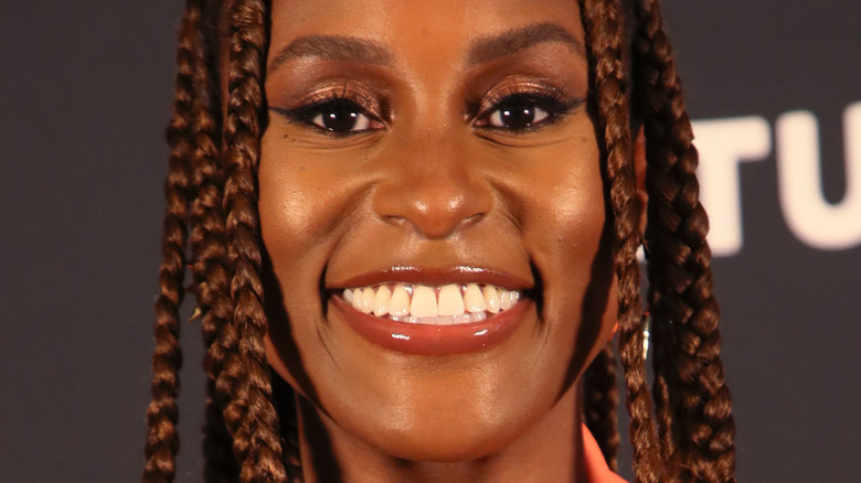 Issa Rae with a big smile