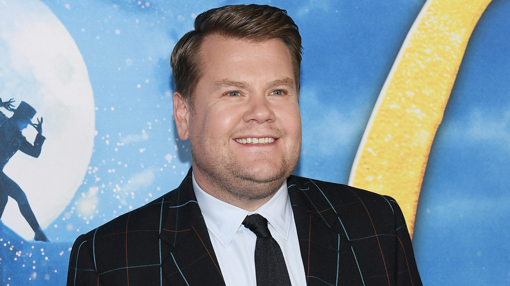 James Corden smiling on the red carpet