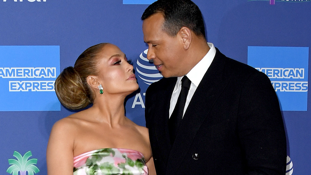 Jennifer Lopez and Alex Rodriguez looking at each other