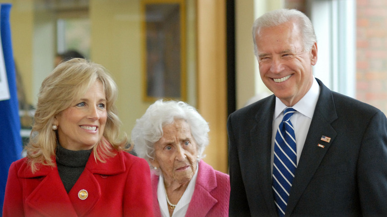 Joe and Jill Biden walk alongside his mother, Jean, in 2008