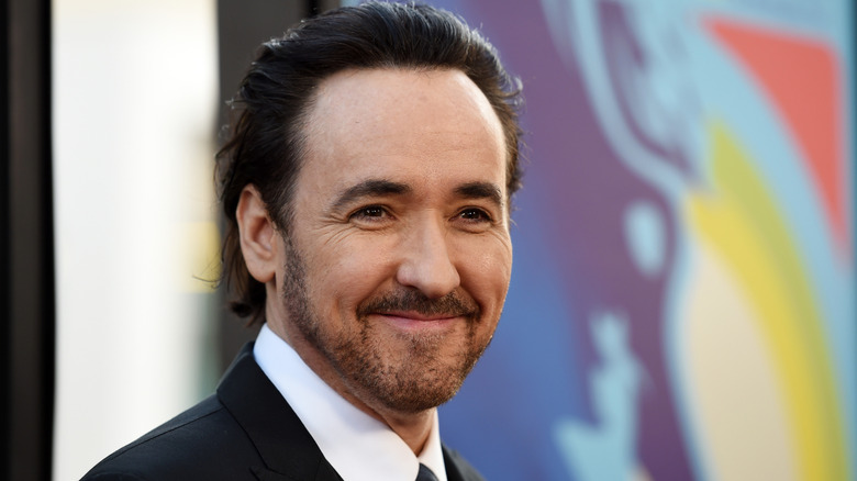 John Cusack smiles in 2015