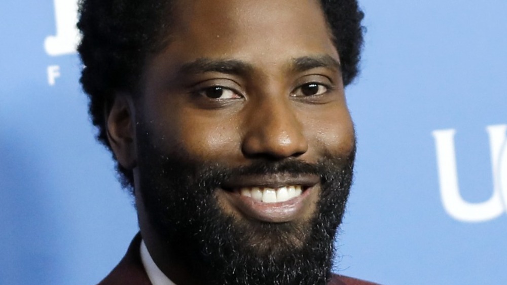 John David Washington smiling