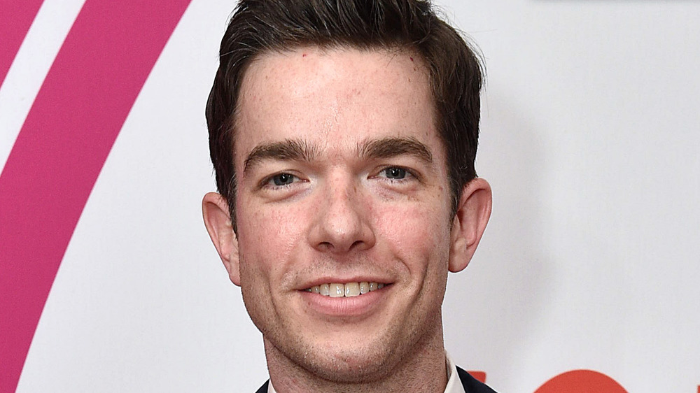 John Mulaney smiling