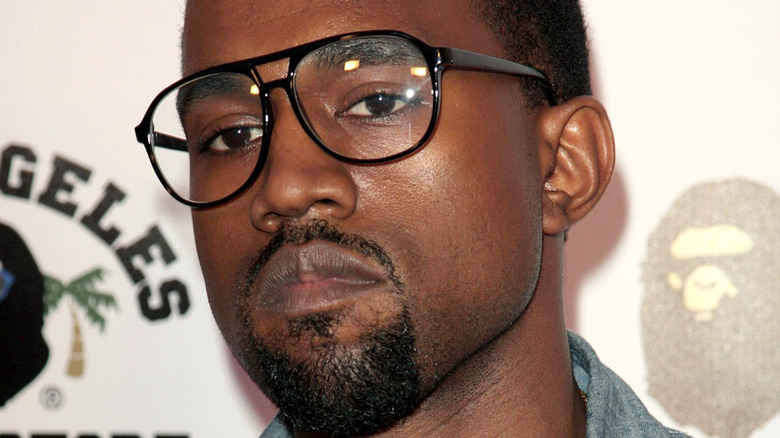 Kanye West wearing glasses