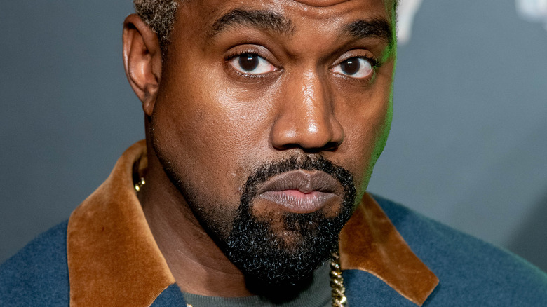 Kanye West looking down