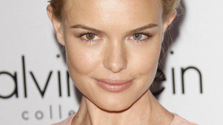 Kate Bosworth looking at the camera with a smirk