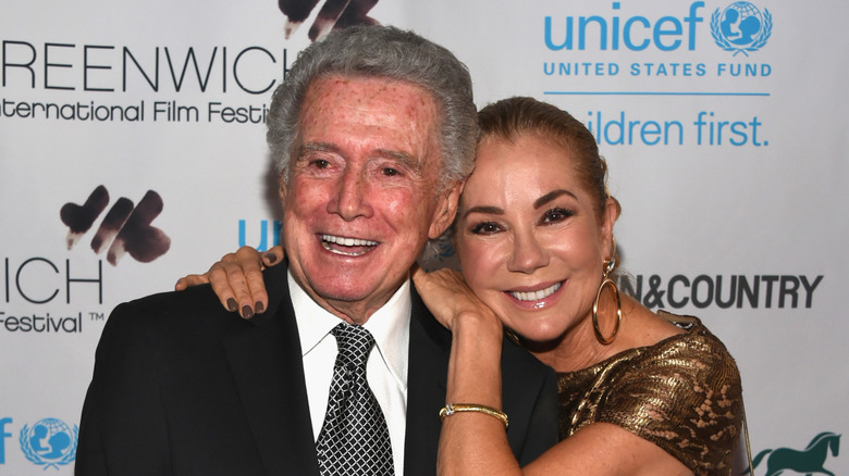 Kathie Lee Gifford and Regis Philbin posing