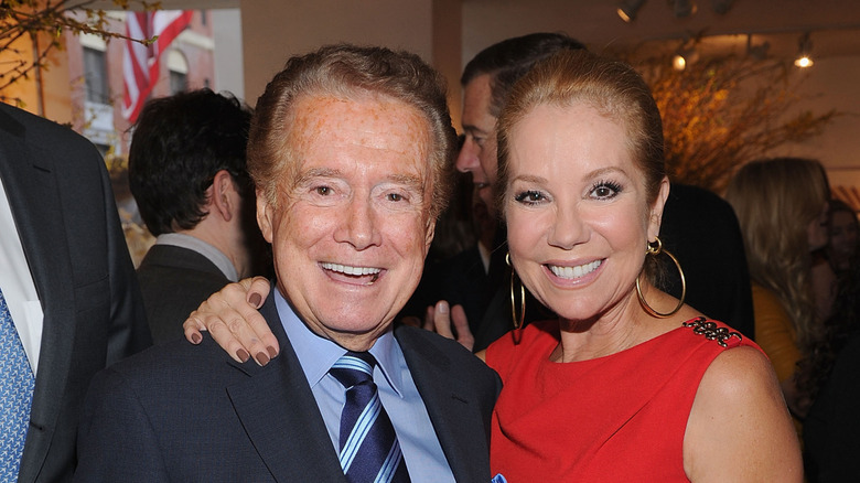 Kathie Lee Gifford and Regis Philbin smiling