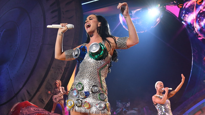 Katy Perry performing in dress made of soda cans and pop tops