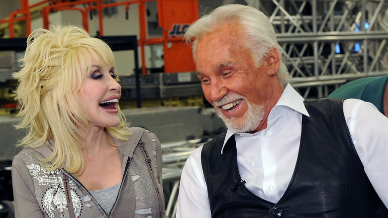 Dolly Parton laughs with Kenny Rogers