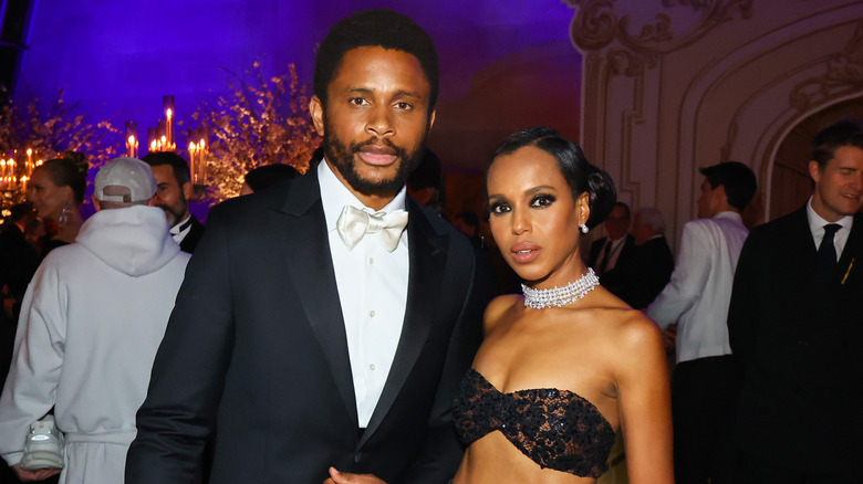 Nnamdi Asomugha and Kerry Washington pose at an event