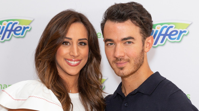 Kevin and Danielle Jonas smiling 