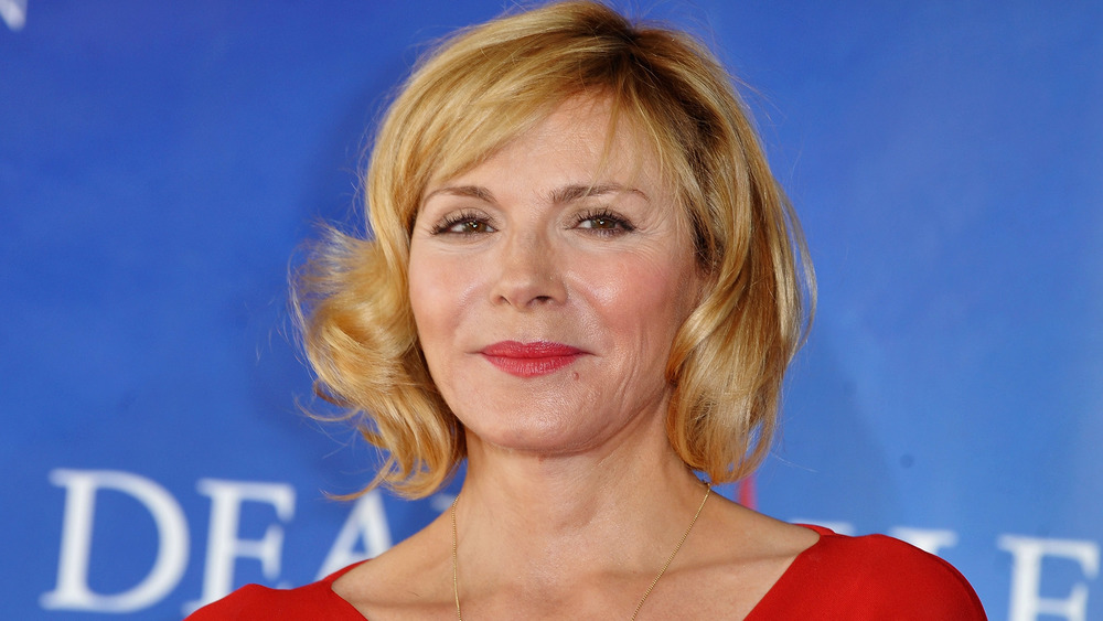 Kim Cattrall smirking