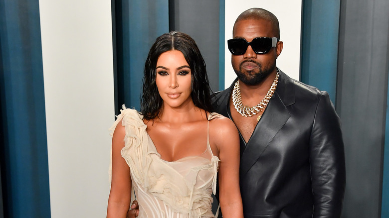 Kim Kardashian West and Kanye West arriving at the 2020 Vanity Fair Oscar Party