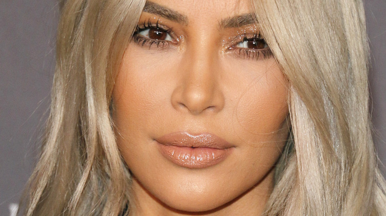 Kim Kardashian with a neutral expression