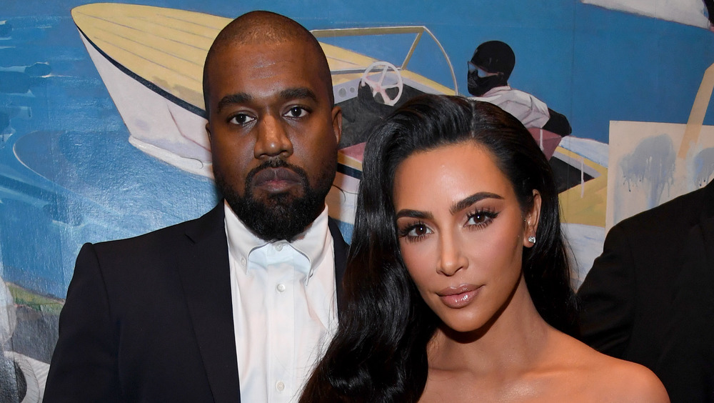 Kim Kardashian and Kanye West at an event 
