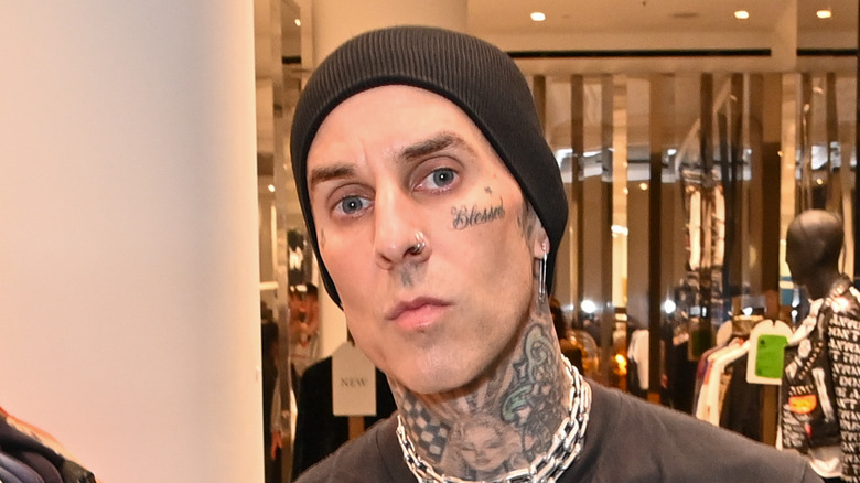 Travis Barker in a store