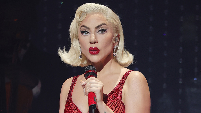 Lady Gaga holding a mic