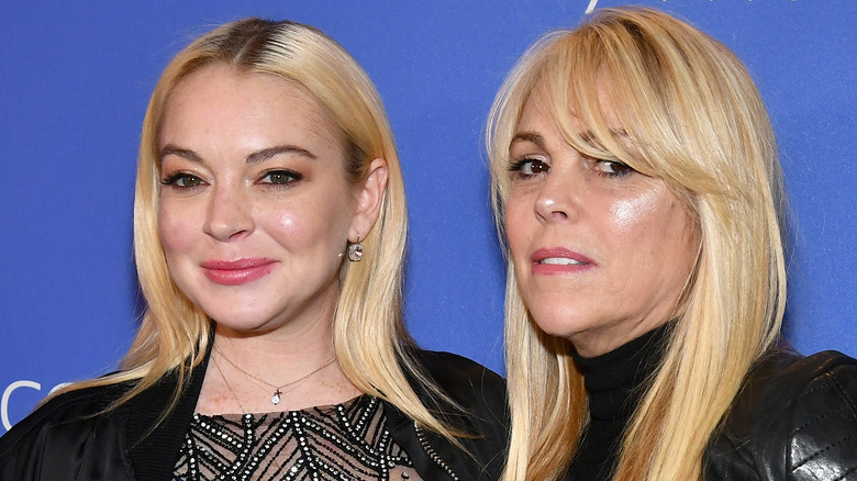Dina Lohan and Lindsay Lohan smiling