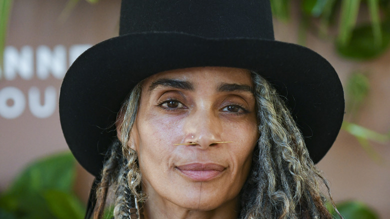 Lisa Bonet wearing black hat