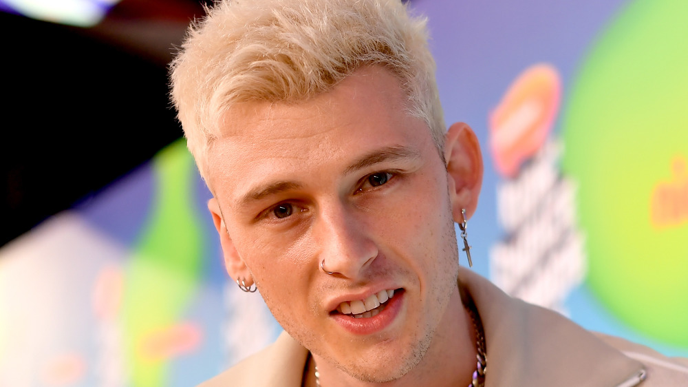 Machine Gun Kelly smiling