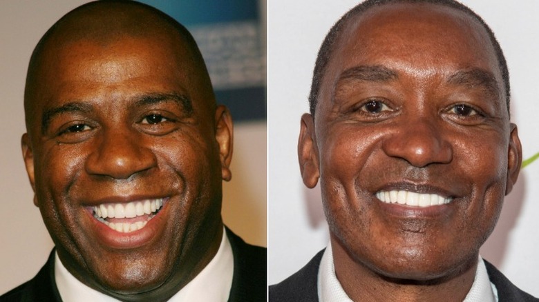 Magic Johnson; Isiah Thomas posing