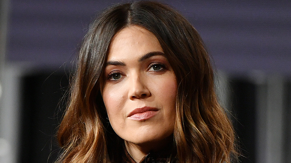 Mandy Moore looks pensively at the camera during a photo call