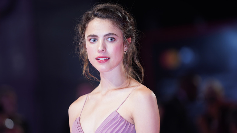 Margaret Qualley looking at camera