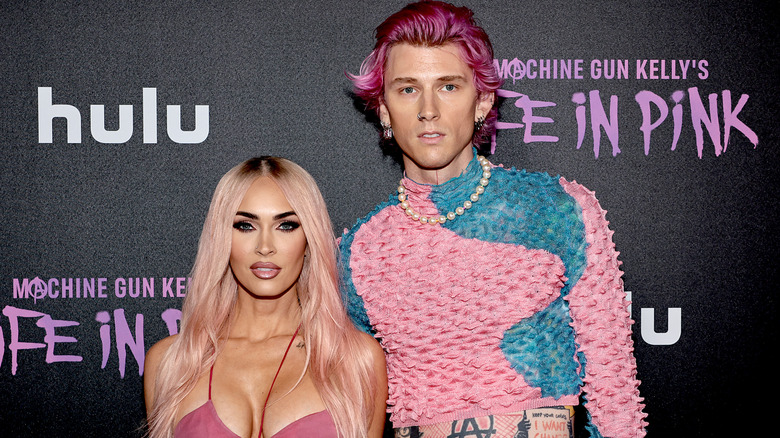 Megan Fox and Machine Gun Kelly pose 