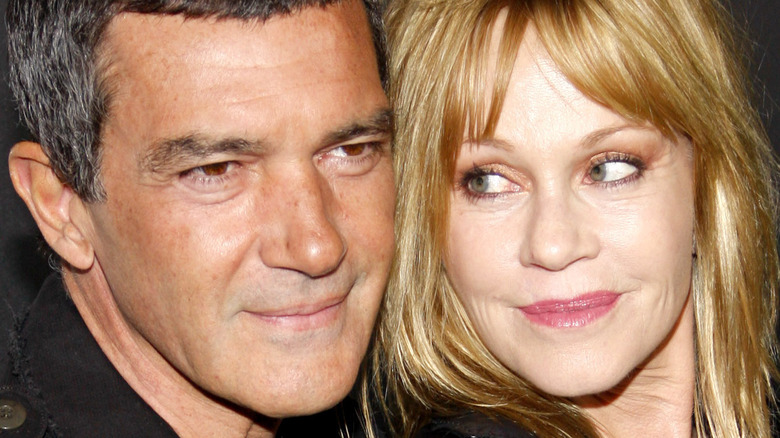 Melanie Griffith smiling at Antonio Banderas