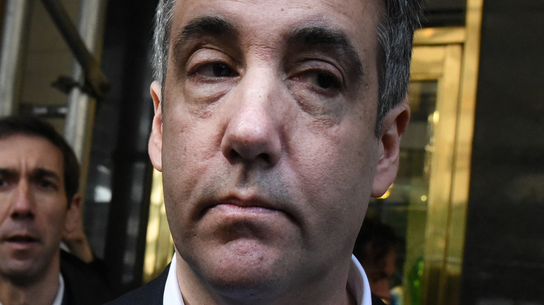 Michael Cohen frowning outside court