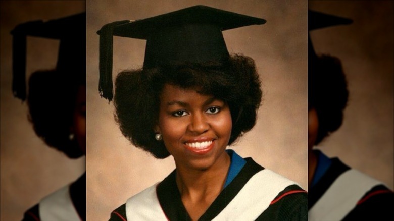 Michelle Obama smiles in her college graduation portrait