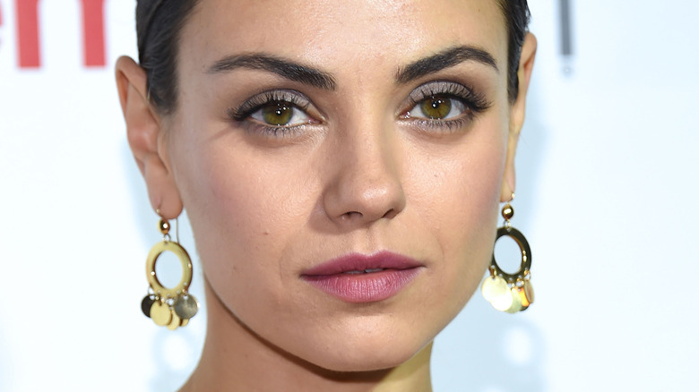 Mila Kunis dangling earrings