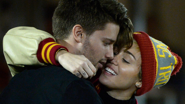 Miley Cyrus cozying up to Patrick Schwarzenegger