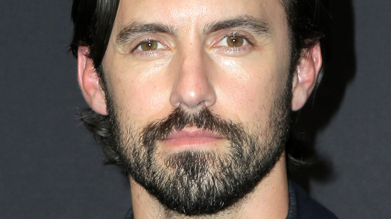 Milo Ventimiglia posing at an event