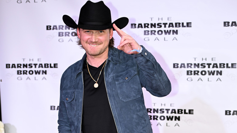 Morgan Wallen posing on red carpet