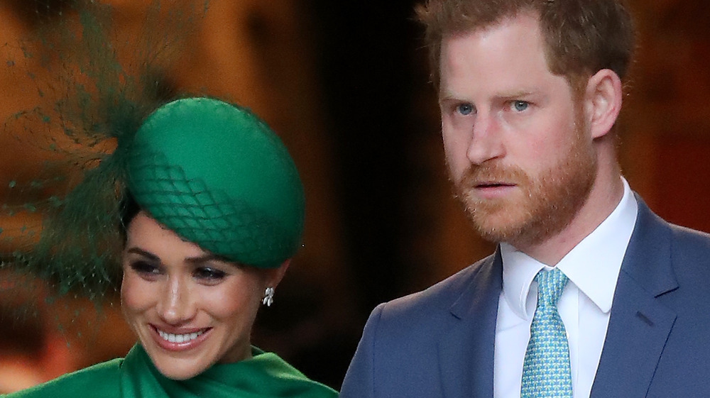 Meghan Markle and Prince Harry posing