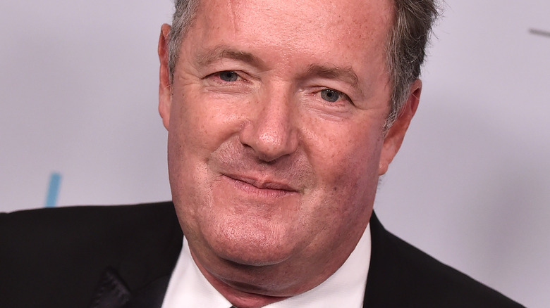 Piers Morgan with slight grin