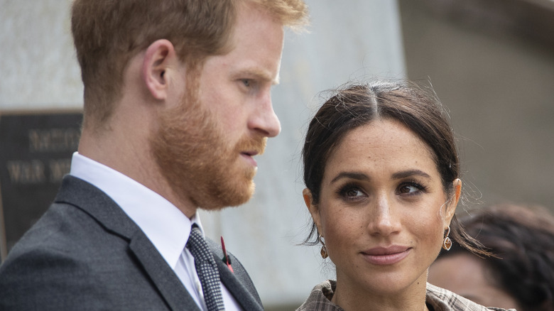 Meghan Markle looking at Prince Harry