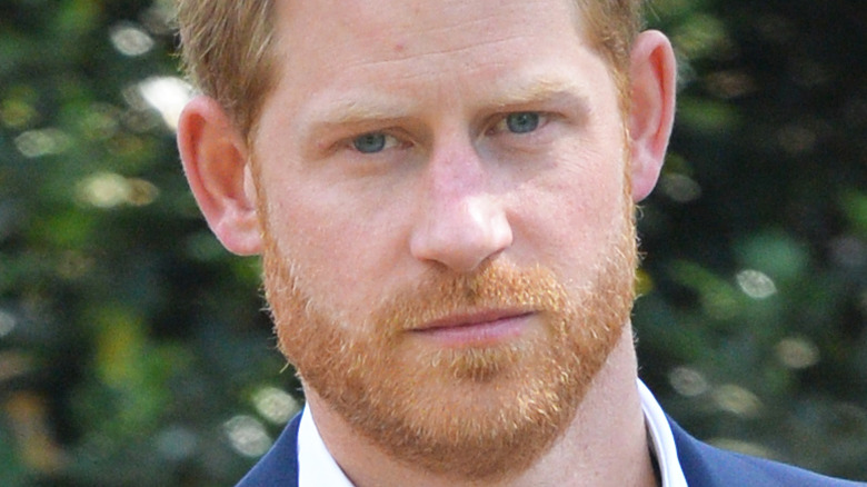 Prince Harry with a serious expression